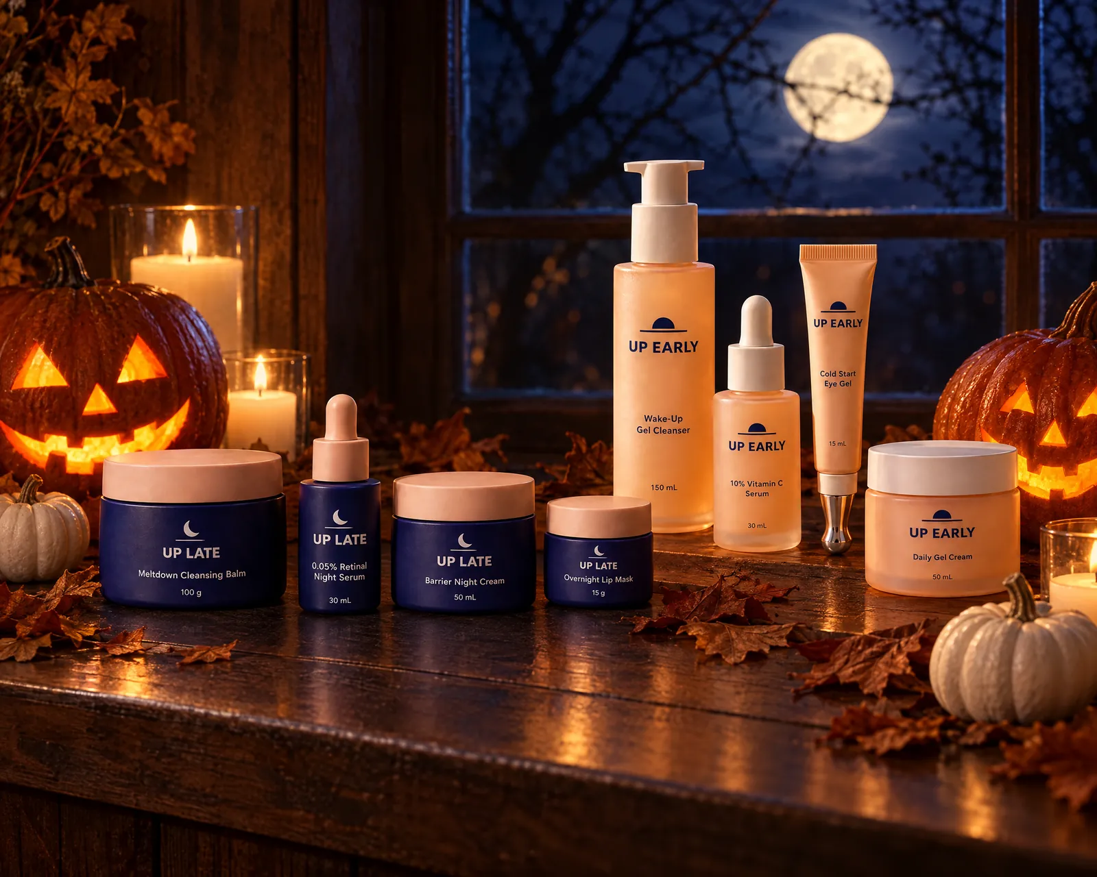 Up Early and Up Late products on a windowsill with carved jack-o'-lanterns, candles and a full moon